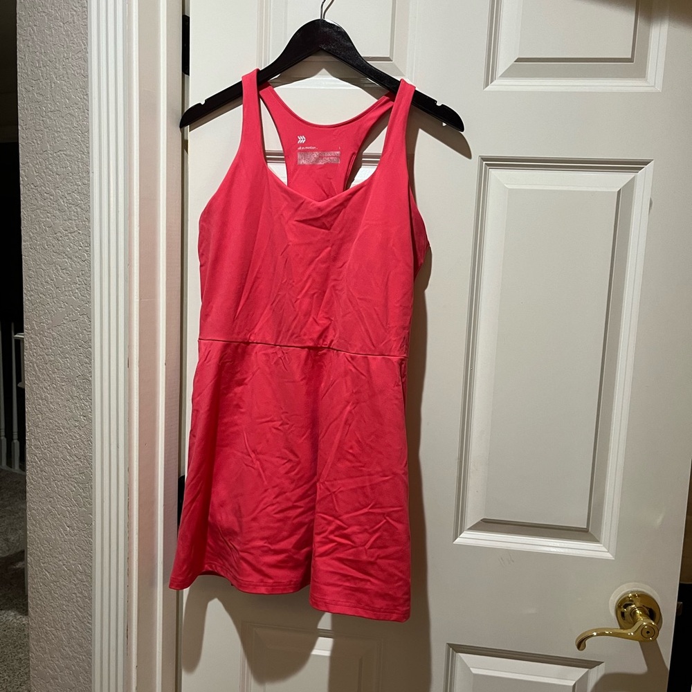 Athletic sport dress with shorts. Like New. Washed but never worn. True to size